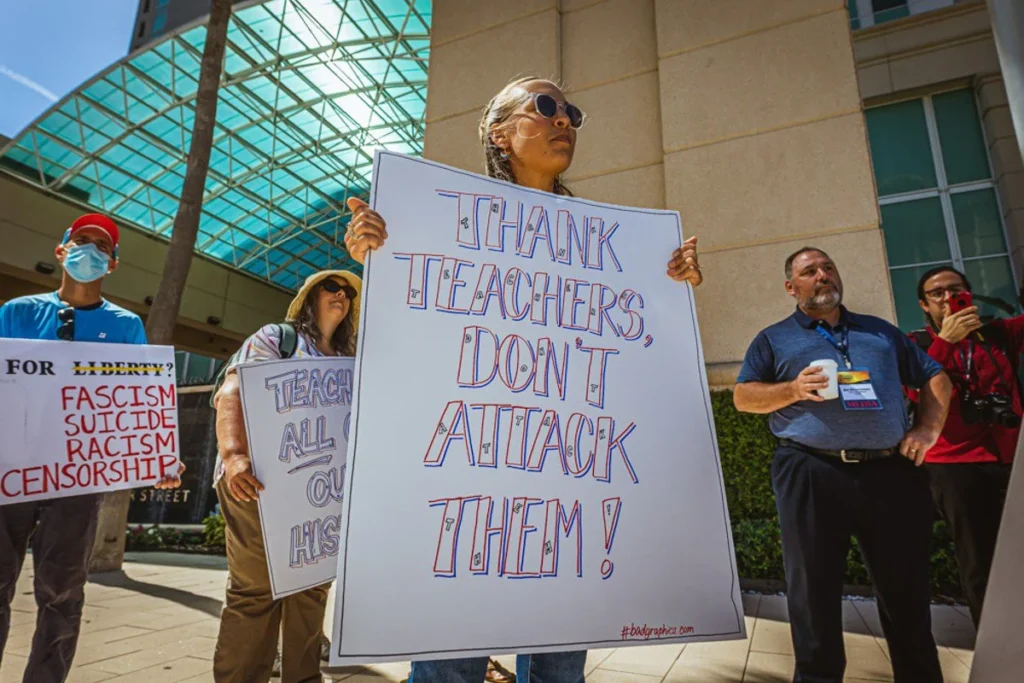 Demonstrators outside Moms for Liberty summit in Tampa, Florida in 2022.